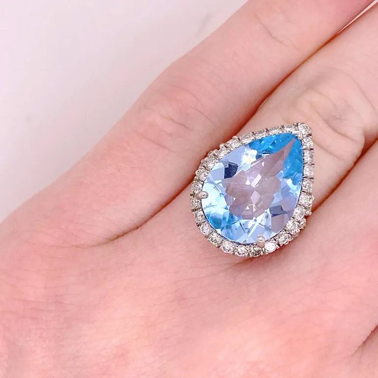 Pear Shaped Blue Topaz Diamond Halo Ring